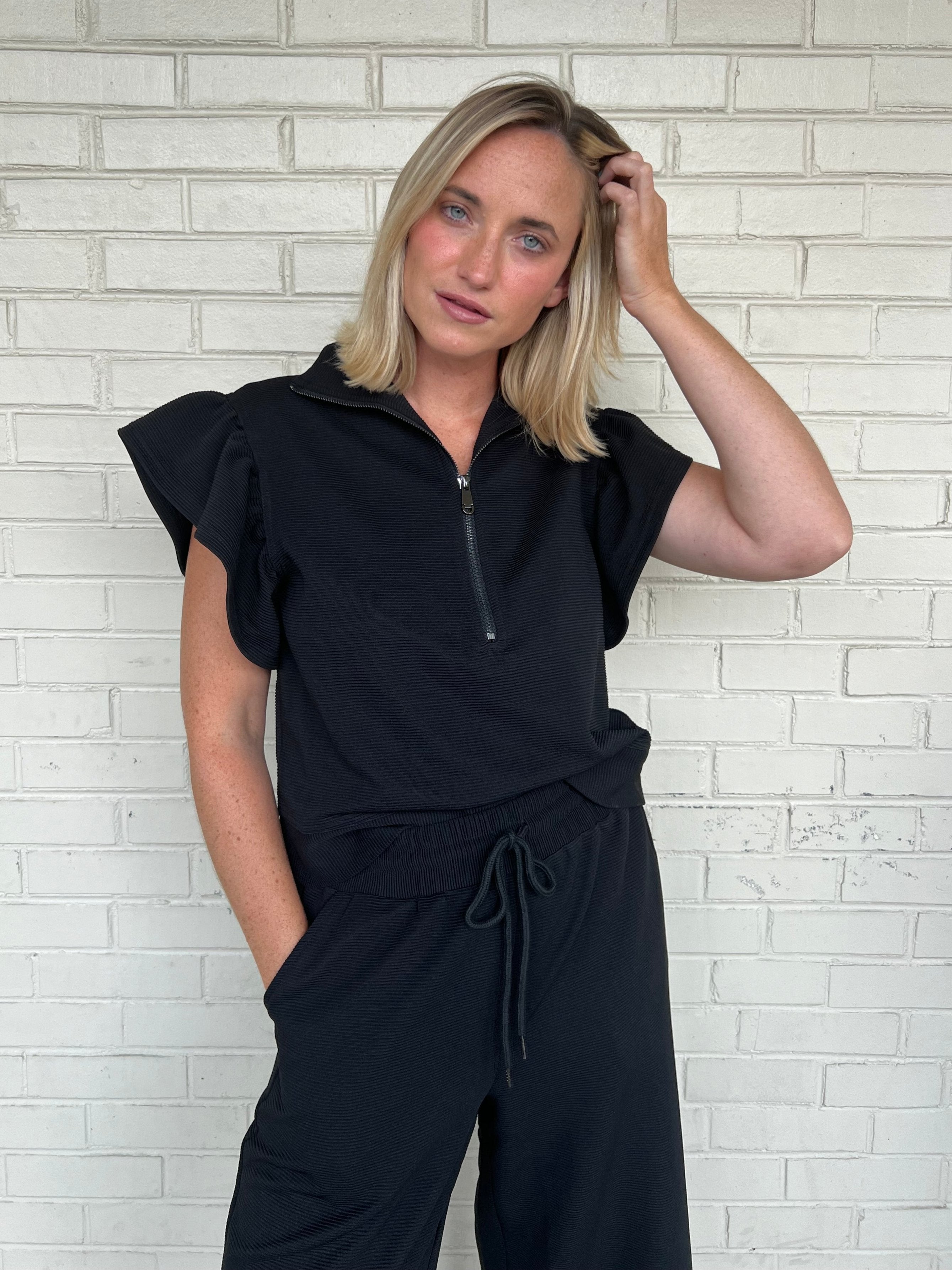 Entro | Black Textured Ruffle Sleeve Top | Sweetest Stitch